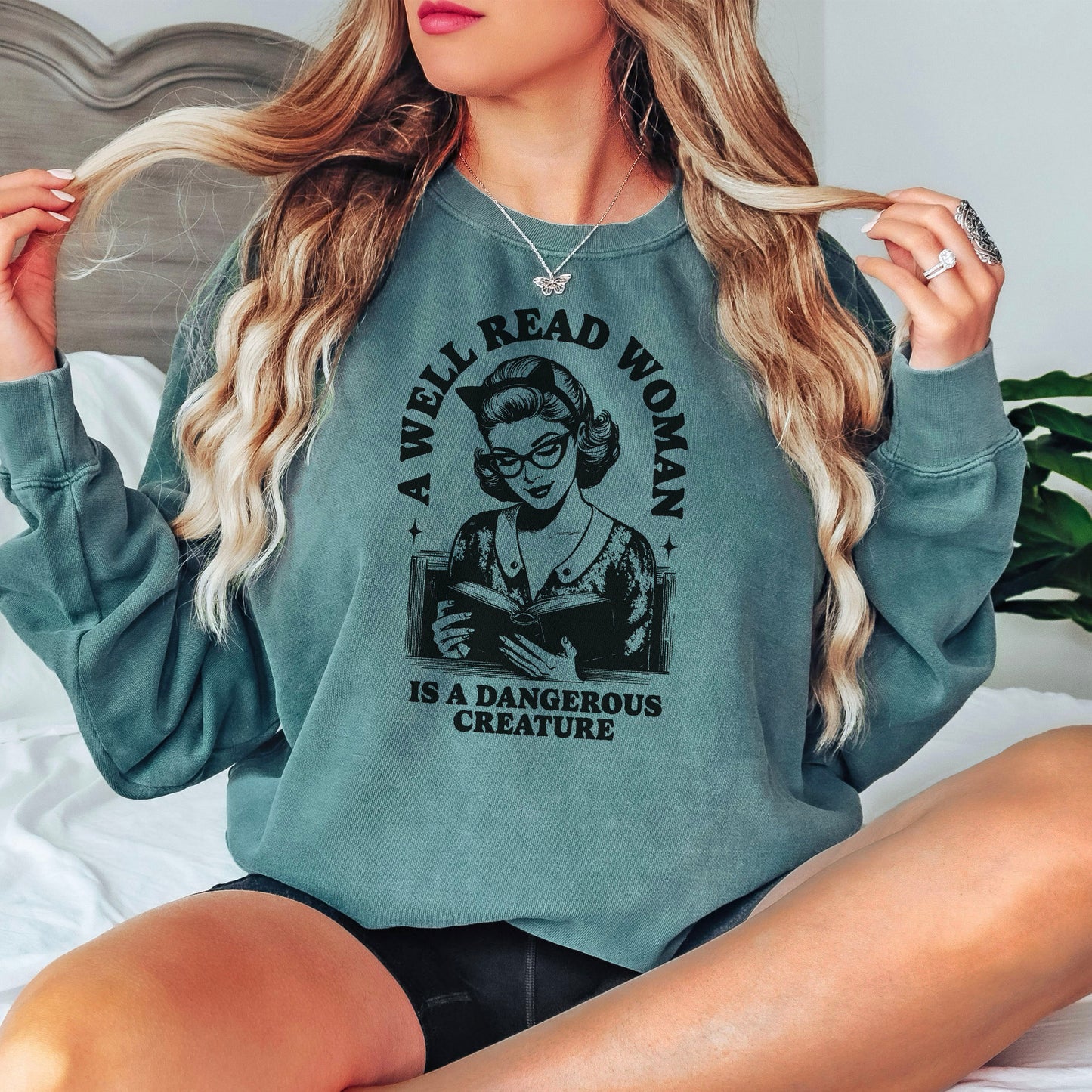 A Well Read Woman Is a Dangerous Creature Premium Sweatshirt