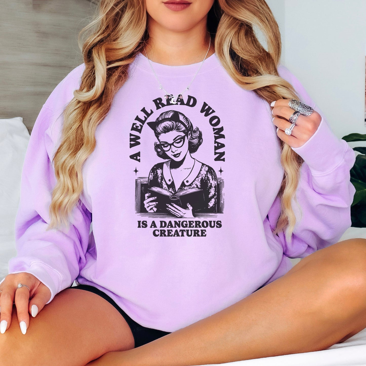 A Well Read Woman Is a Dangerous Creature Premium Sweatshirt