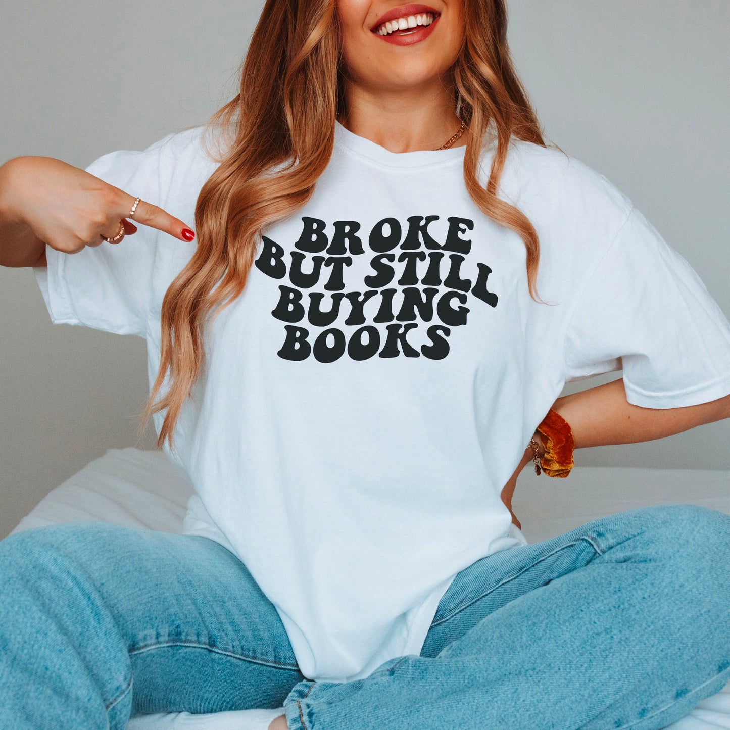 Broke But Still Buying Books Premium T-Shirt - Natalia’s Design Studio